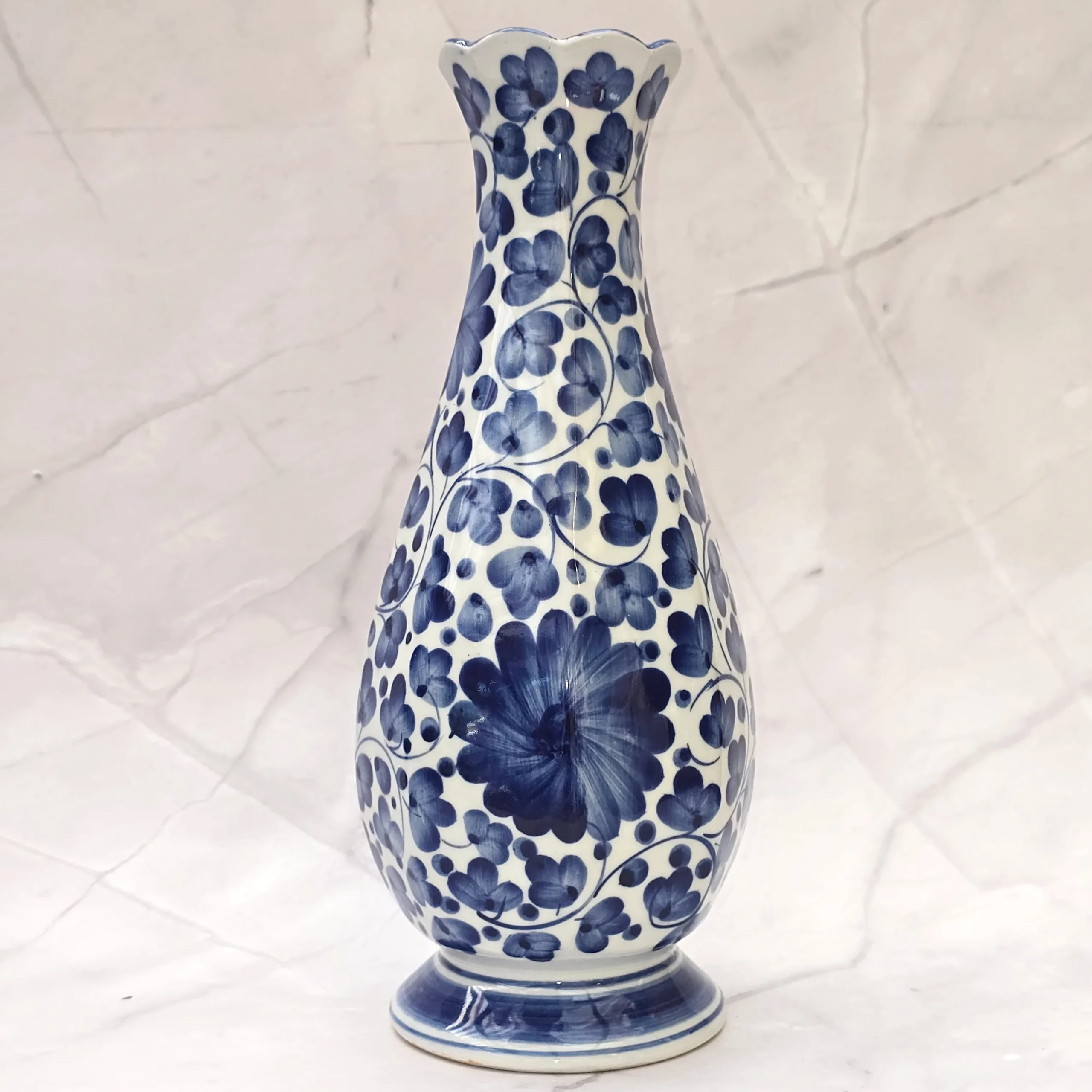 Blauw/witte vaas met bloemen